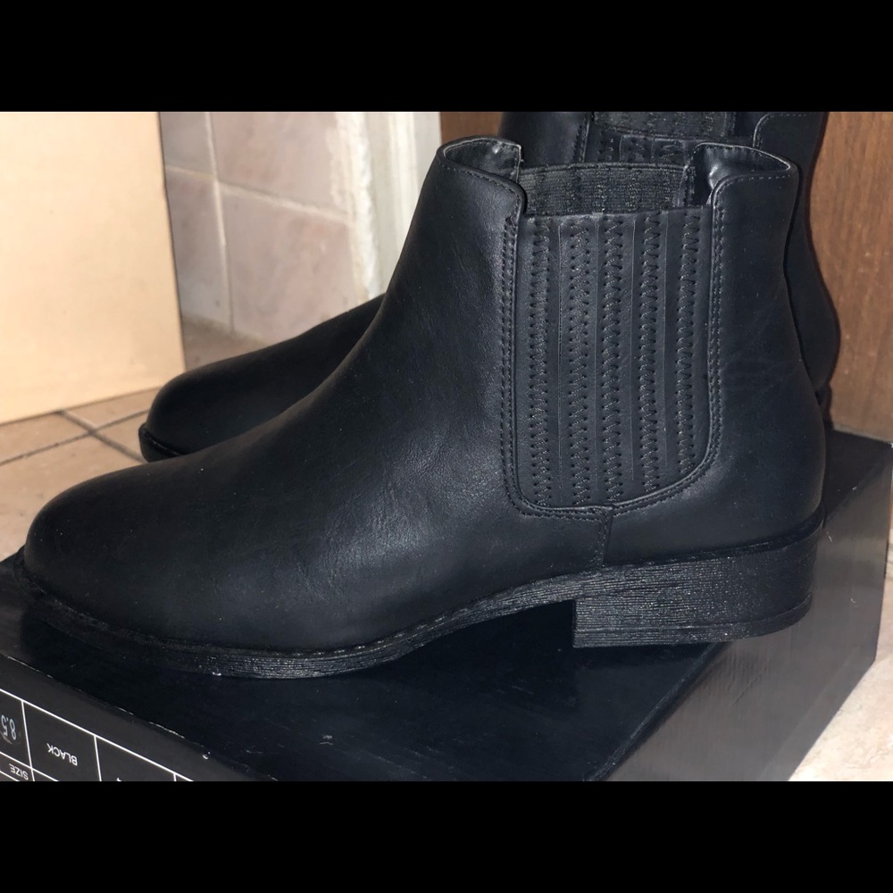 Black booties never worn